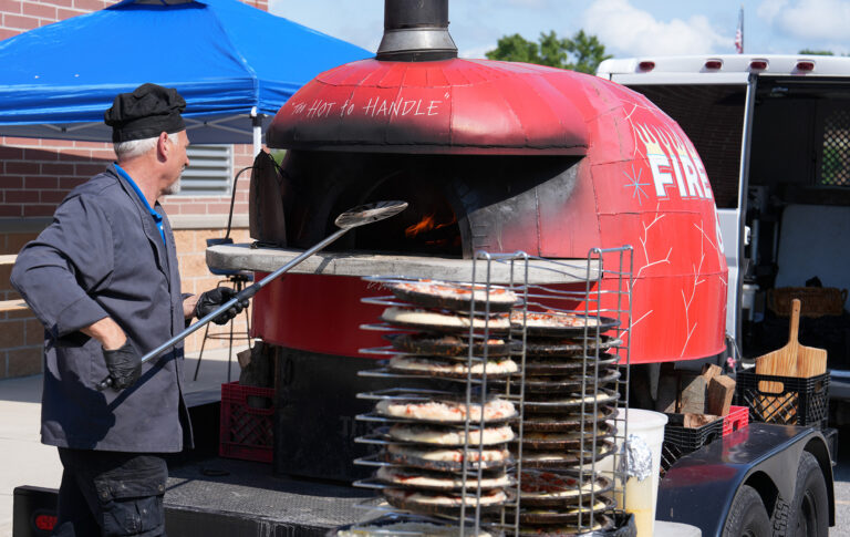 John Roberto using mobile pizza oven